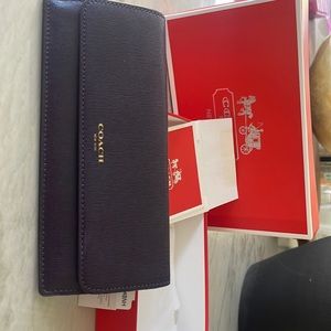 Coach wallet. Aubergine color. New with tags